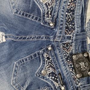 Miss Me's bootcut jeans.